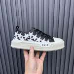 Amiri Glitter Stars Court Low in Black AWFOSR1106-001