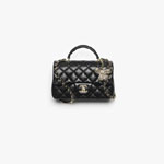 Chanel Mini classic bag with top handle in black AS2431 B22112 94305
